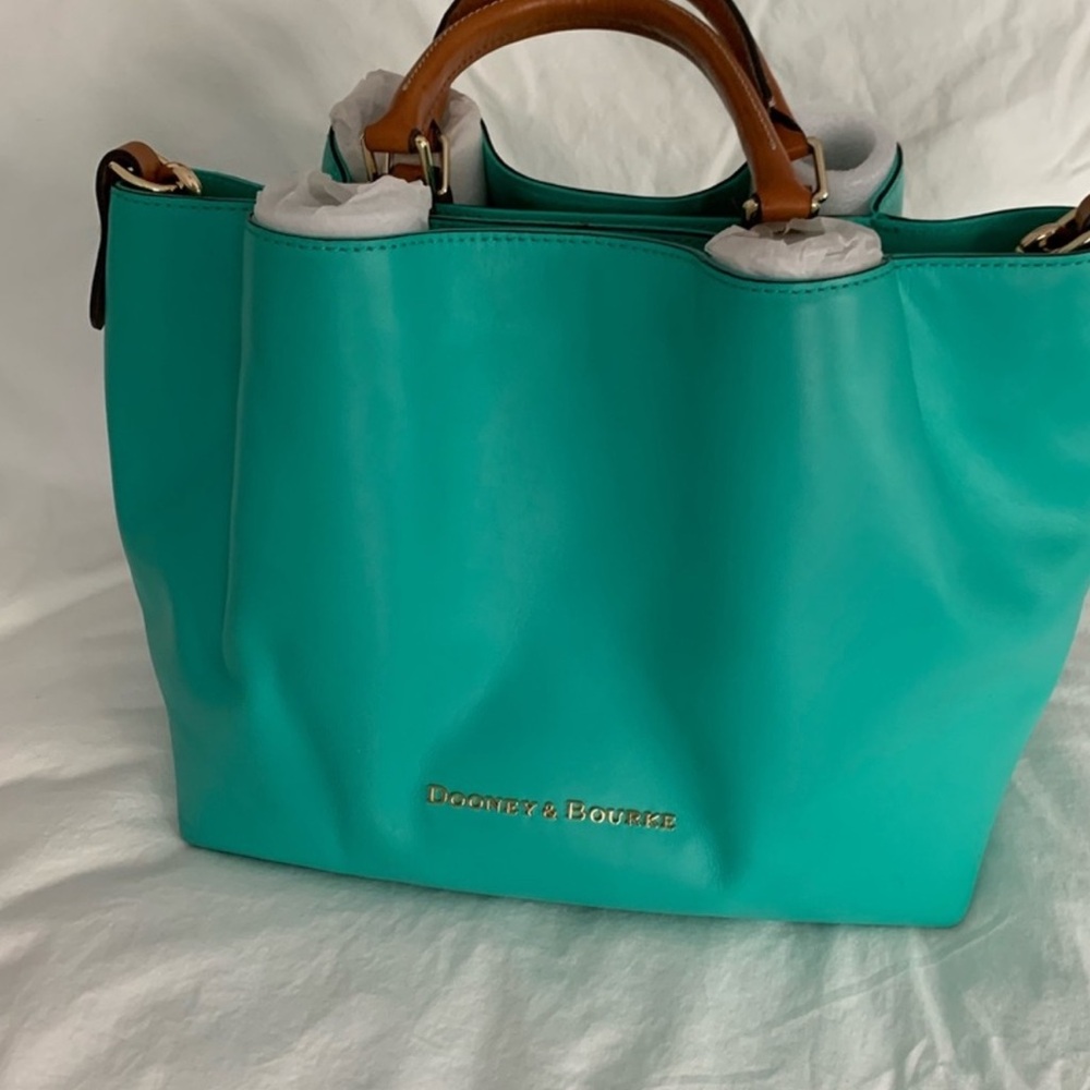 Dooney & Bourke  southwest Turquoise Barlow purse 
Like  New !!!!!! SALE!!!!!!!
